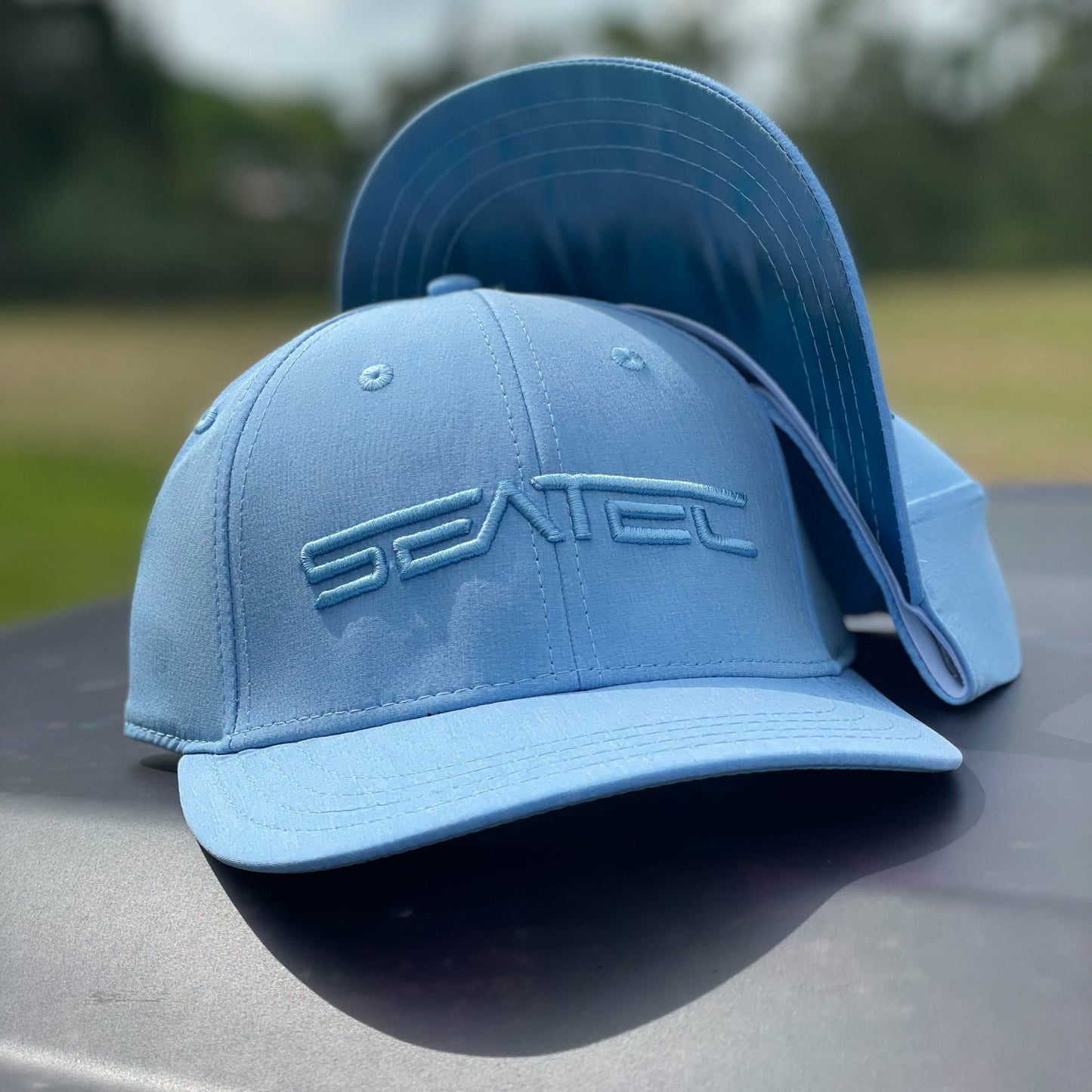 Wahoo Tri Tec performance snapback trucker hat with flex sweatband by Seatec Outfitters