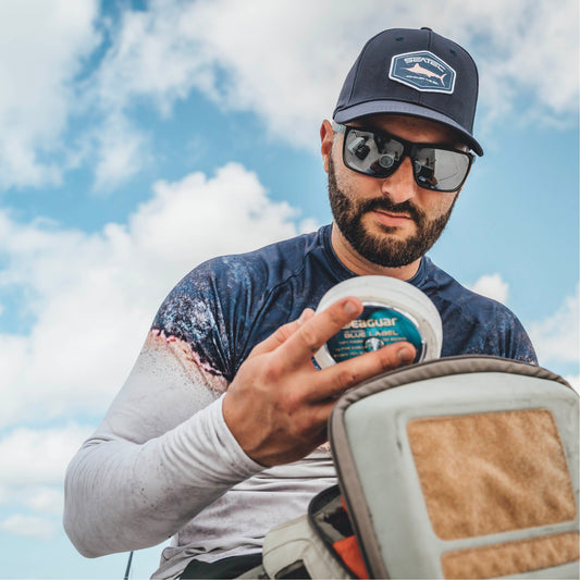 White Marlin tri tec performance snapback trucker hat with flex sweatband by Seatec Outfitters