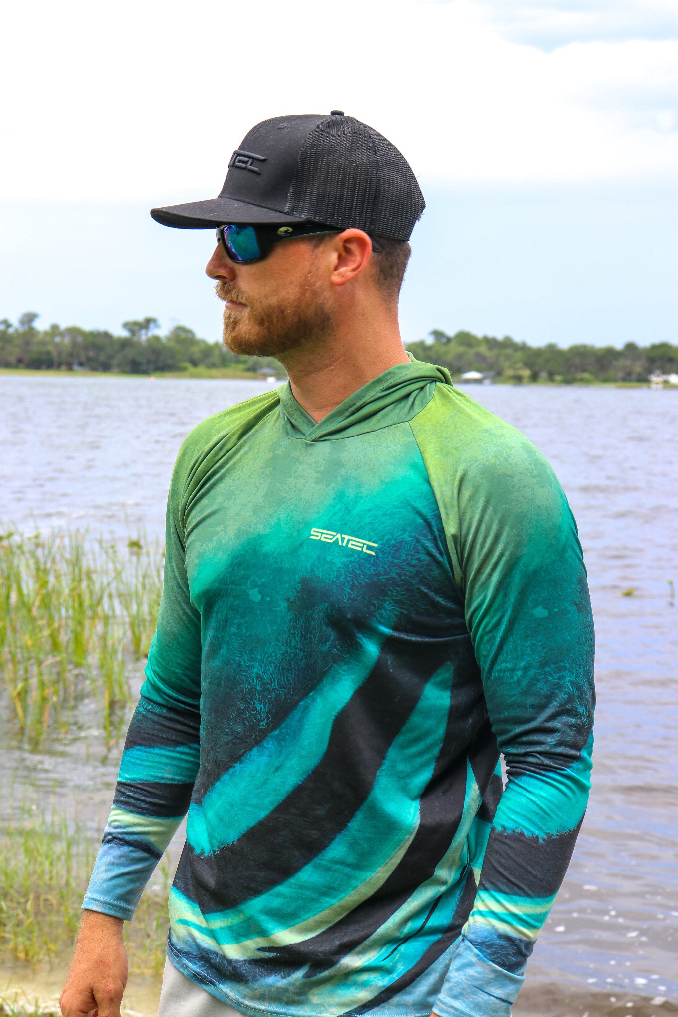 Roosterfish Men's Hooded Performance Shirt – Lightweight, moisture-wicking fishing shirt for active outdoor use with UPF sun protection