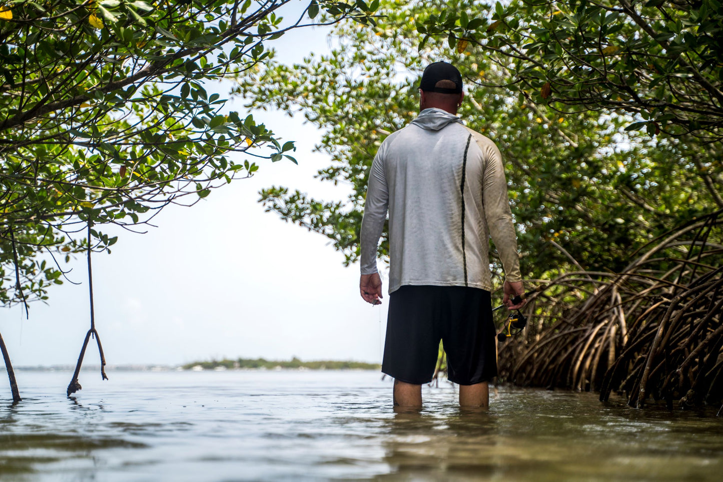 Snook Men's Hooded Performance Shirt – Lightweight, moisture-wicking fishing shirt for active outdoor use with UPF sun protection